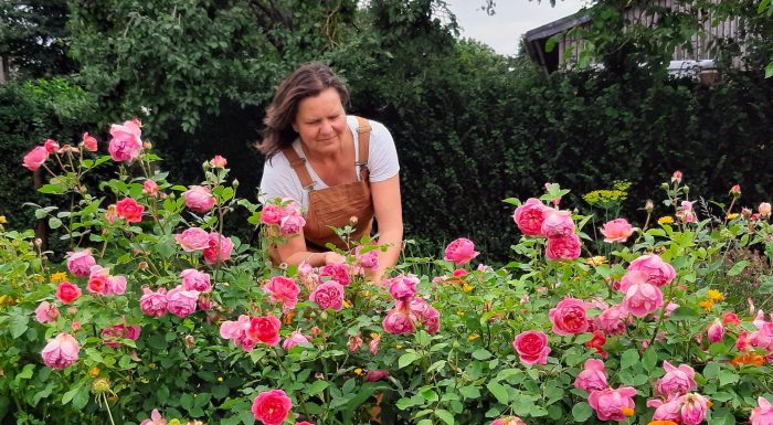 rosie insley tending her flowers